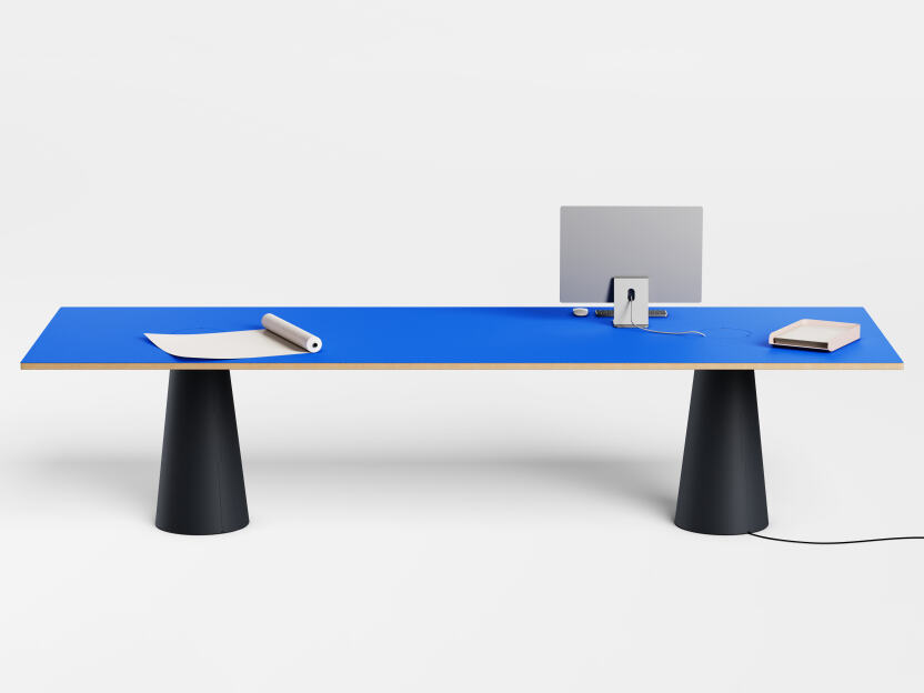 ALT (All Linoleum Table) conical table base with rectangular tabletop and embedded cable management solutions. Lined with Midnight Blue and Carbon linoleum, designed by Keiji Takeuchi