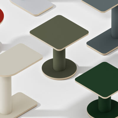 A collection of OFF-CUT side tables designed by BIG-GAME available in half-round, rectangular, round, and square formats, featuring various linoleum color combinations.