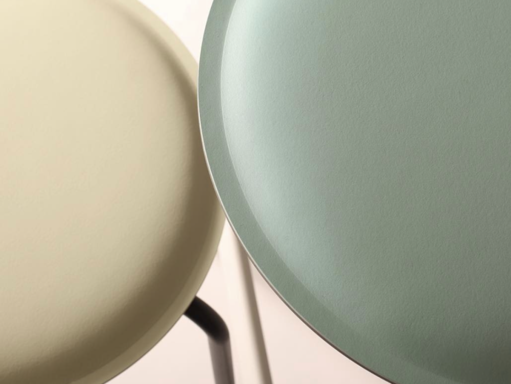 Close-up on two Ravioli stools designed by Daniel Lorch for Faust Linoleum