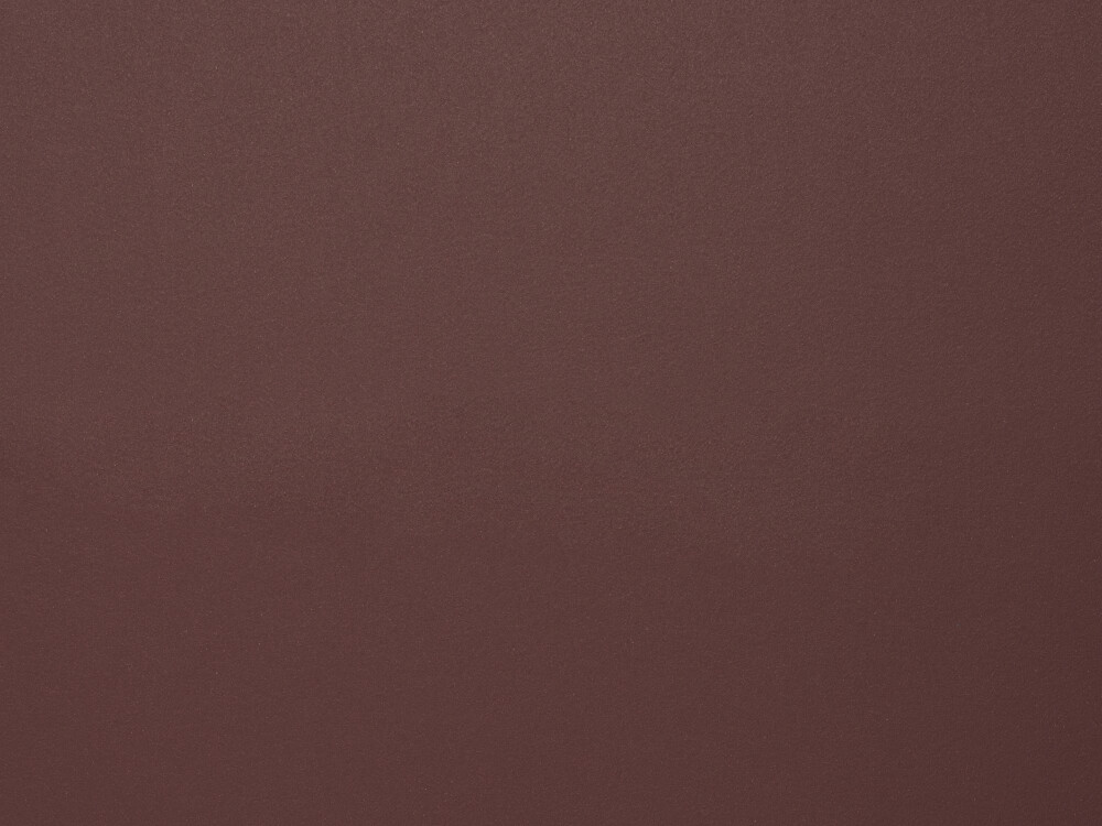 Nahaufnahme der Linoleum-Oberfläche in Burgundy von Faust – matt, fein strukturiert, in einem tiefen, burgundfarbenen Rotton gehalten.