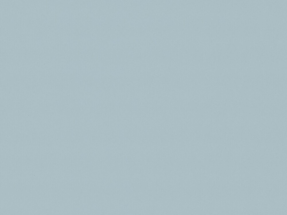 Linoleum-Oberfläche in Blue Haze – matter, fein texturierter Belag in kühlem Aquablau, dargestellt als Materialdetail einer Faust-Tischplatte.