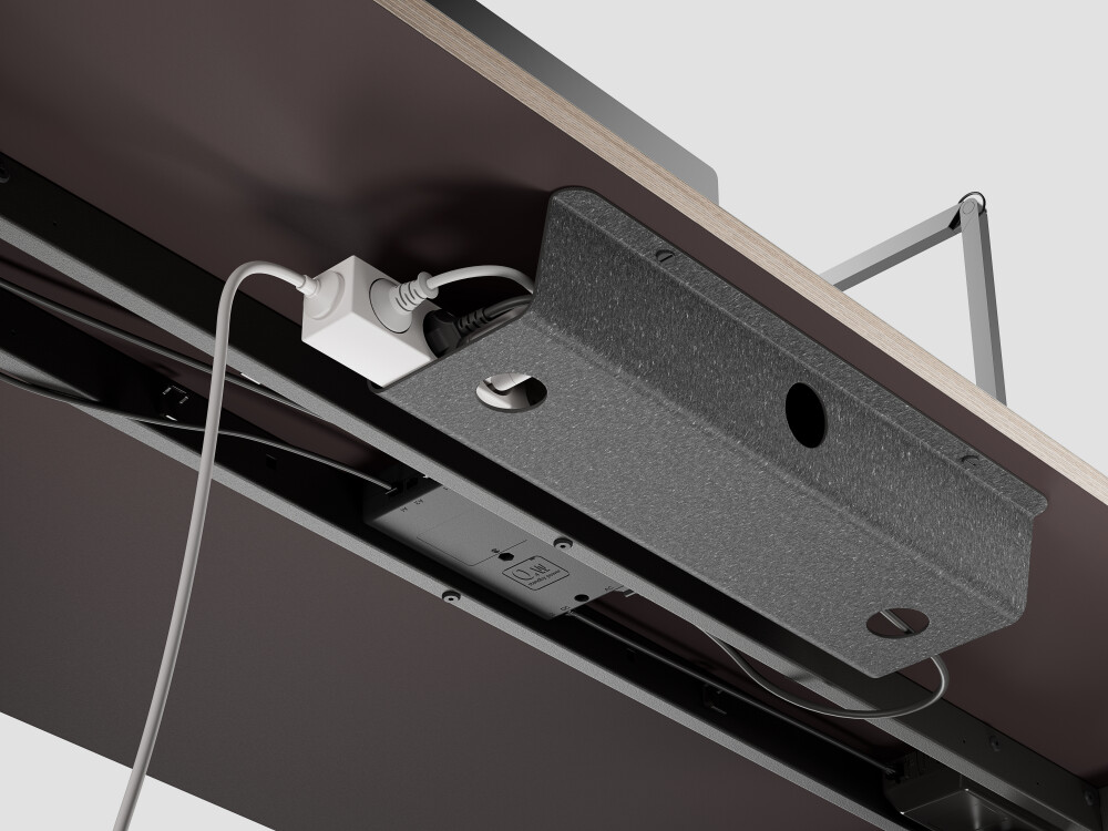 Mounted cable tray from Faust under desk top - linoleum inside, Lefa outside, with power strip and cables, design: Daniel Lorch.