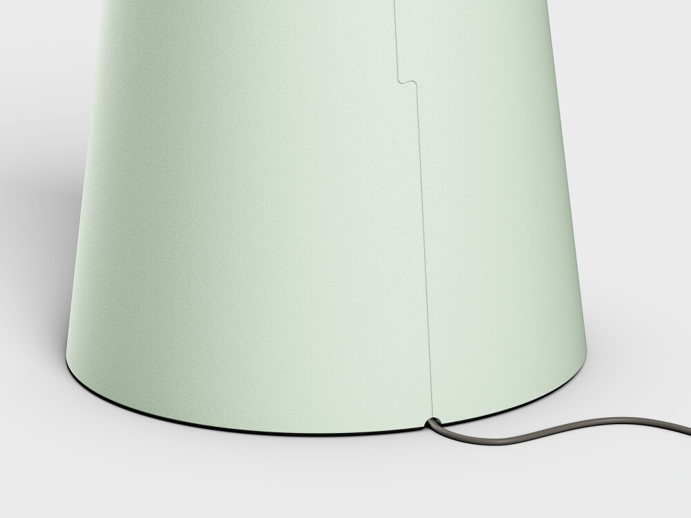 Detailed view of the cone base of an ALT Linoleum table with integrated cable management.