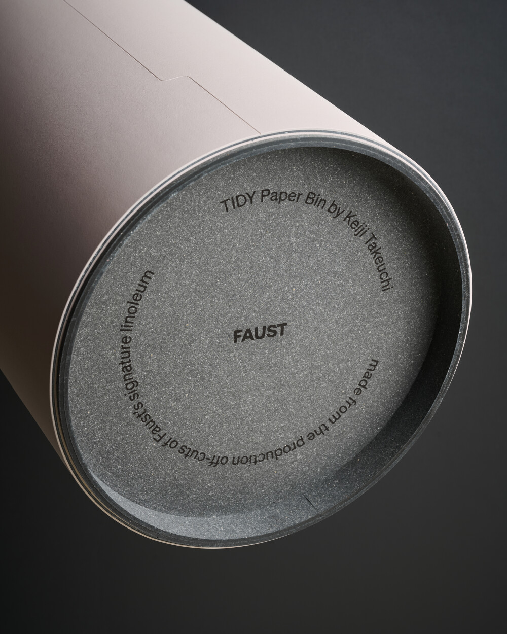 TIDY Paper Bin by Keiji Takeuchi for Faust, cylindrical with linoleum surface, detail view of the base with branding.